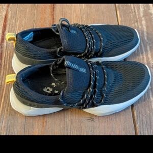 Sorel kinetic impact lace sneaker in black/white/yellow women's size 8.5